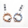 Perlenring en medaille wonderbaarlijk