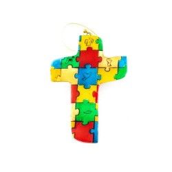 Croix avec un motif puzzle multicolore