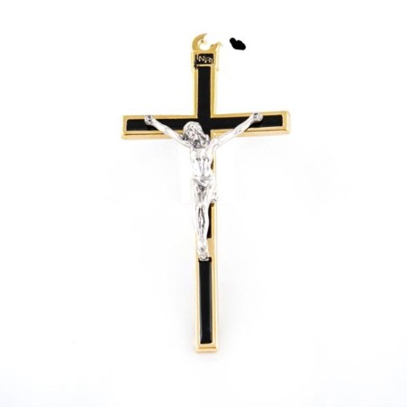 Crucifix en métal doré et émail noir avec Christ argenté. 13 cm