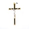 Crucifix en métal doré et émail noir avec Christ argenté. 13 cm