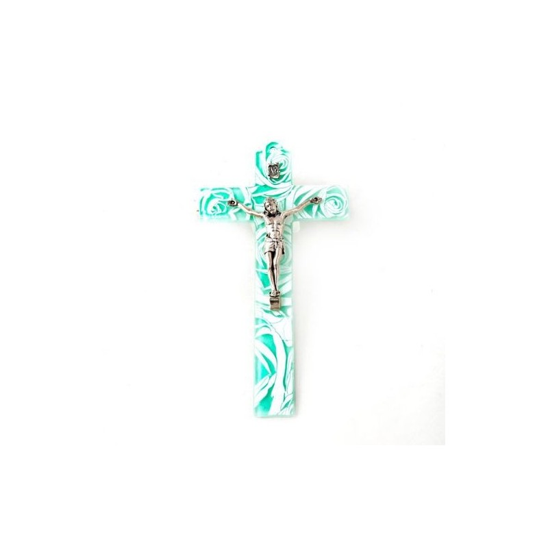 Crucifix en verre vert avec des décorations florales blanches. 16 cm