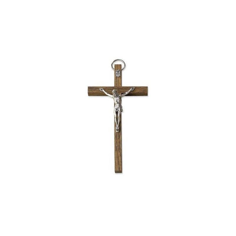 Een houten kruis met een metaal Christus. 14 cm