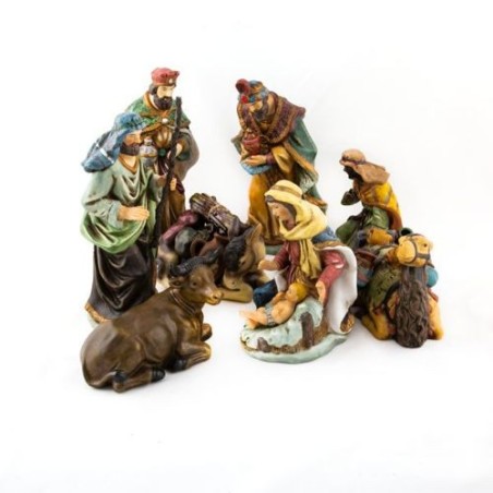 Crèche composée de 10 pièces en porcelaine. 23 cm