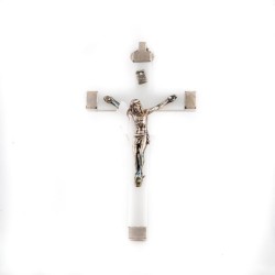 Crucifix en métal argenté avec insert lumineux. 9 cm