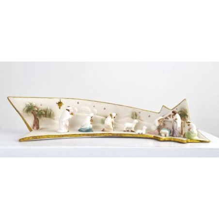 Crèche en porcelaine sur étoile filante 25x10cm