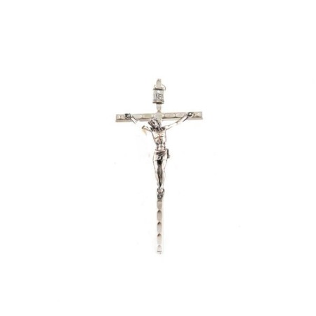 Crucifix en métal argenté. 11 cm