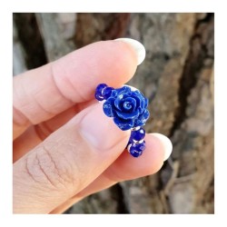 Blauwe kristallen ring met metalen kralen AG en hars roze