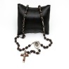 Rozenkrans met bruin houten water op ketting