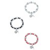 Elastische armband parels en medaille S. Benoit zilver wit zwart rood