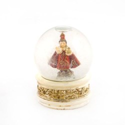 Boule à neige de l'Enfant Jésus de Prague en résine. 9 cm