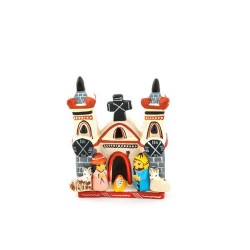 Kerststal met een kerk van aardewerk