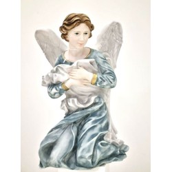 Statue peinte d'un ange à genoux en porcelaine. 40 cm