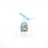 Boule 0neige en forme de cloche avec la Sainte Famille et notre Dame de Banneux, disponible en bleu ou rose